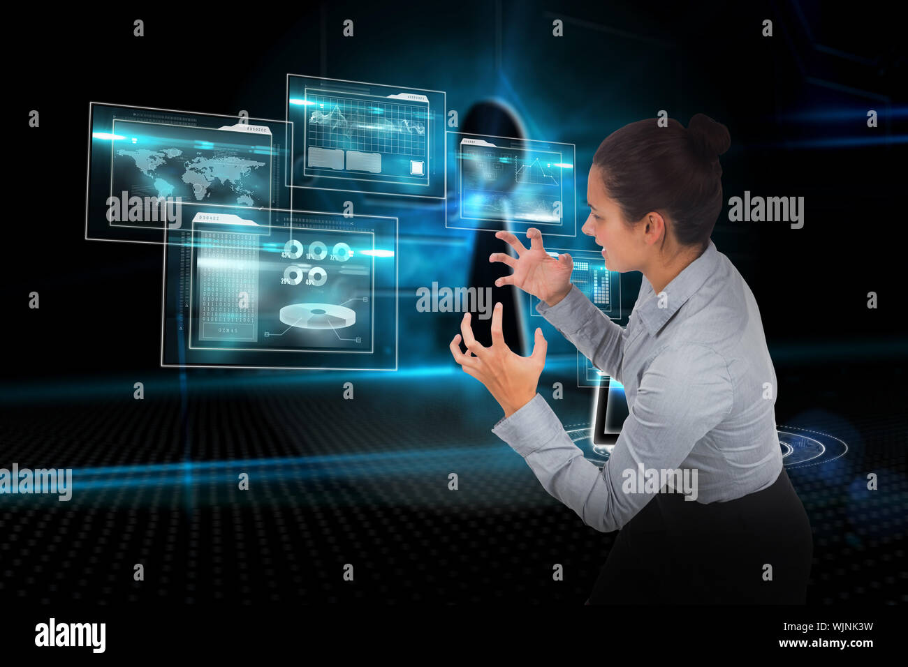 Furious businesswoman gesturing against keyhole on technological background Stock Photo