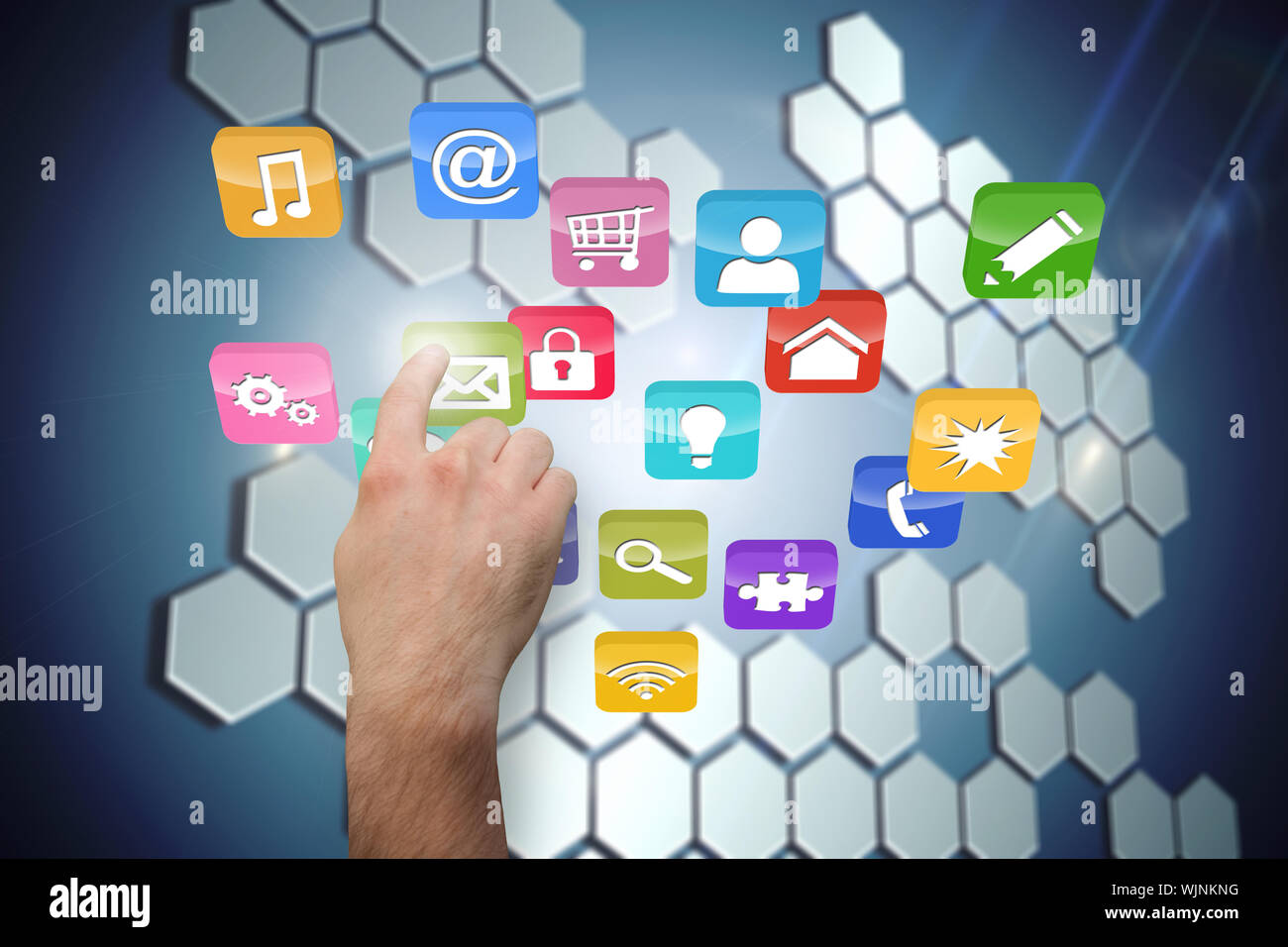 Hand pointing against technological background with hexagons Stock Photo