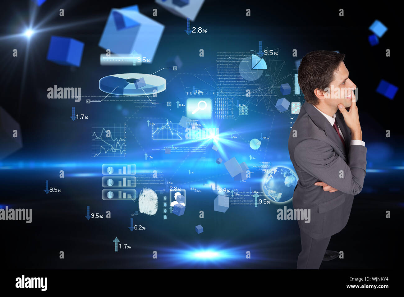 Thinking businessman touching his chin against boxes on technical background Stock Photo