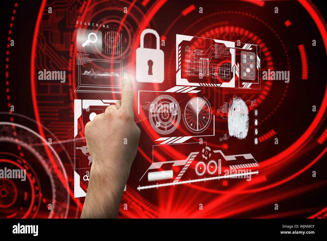 Hand pointing against shiny red circles on black background Stock Photo