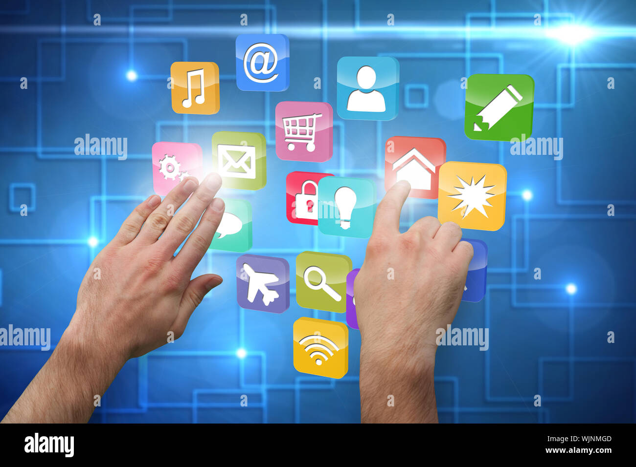 Hands pointing and presenting against black background with shiny squares Stock Photo