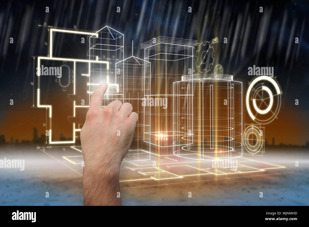 Hand pointing against cityscape on the horizon Stock Photo