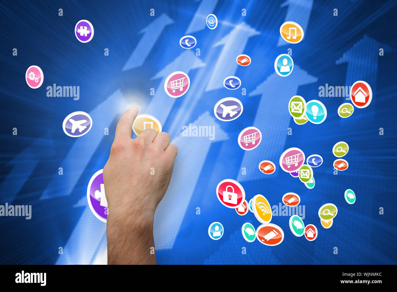 Hand pointing against futuristic shiny arrow pointing upwards Stock Photo