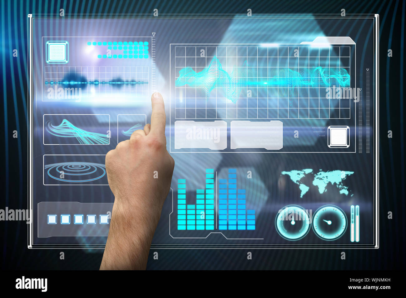 Hand pointing against shiny hexagons on black background Stock Photo