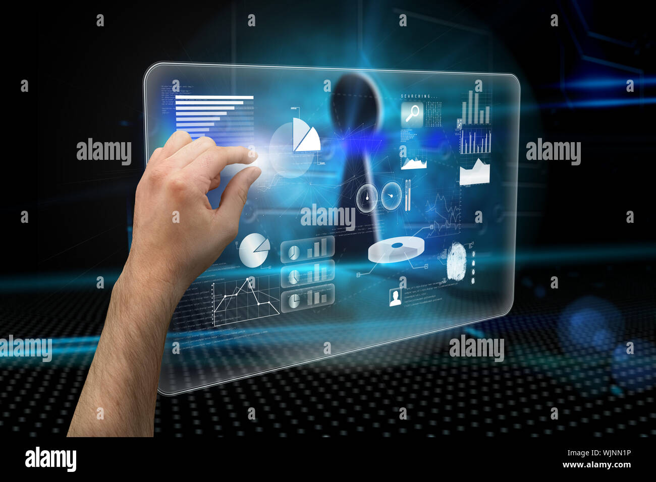 Hand presenting against keyhole on technological background Stock Photo