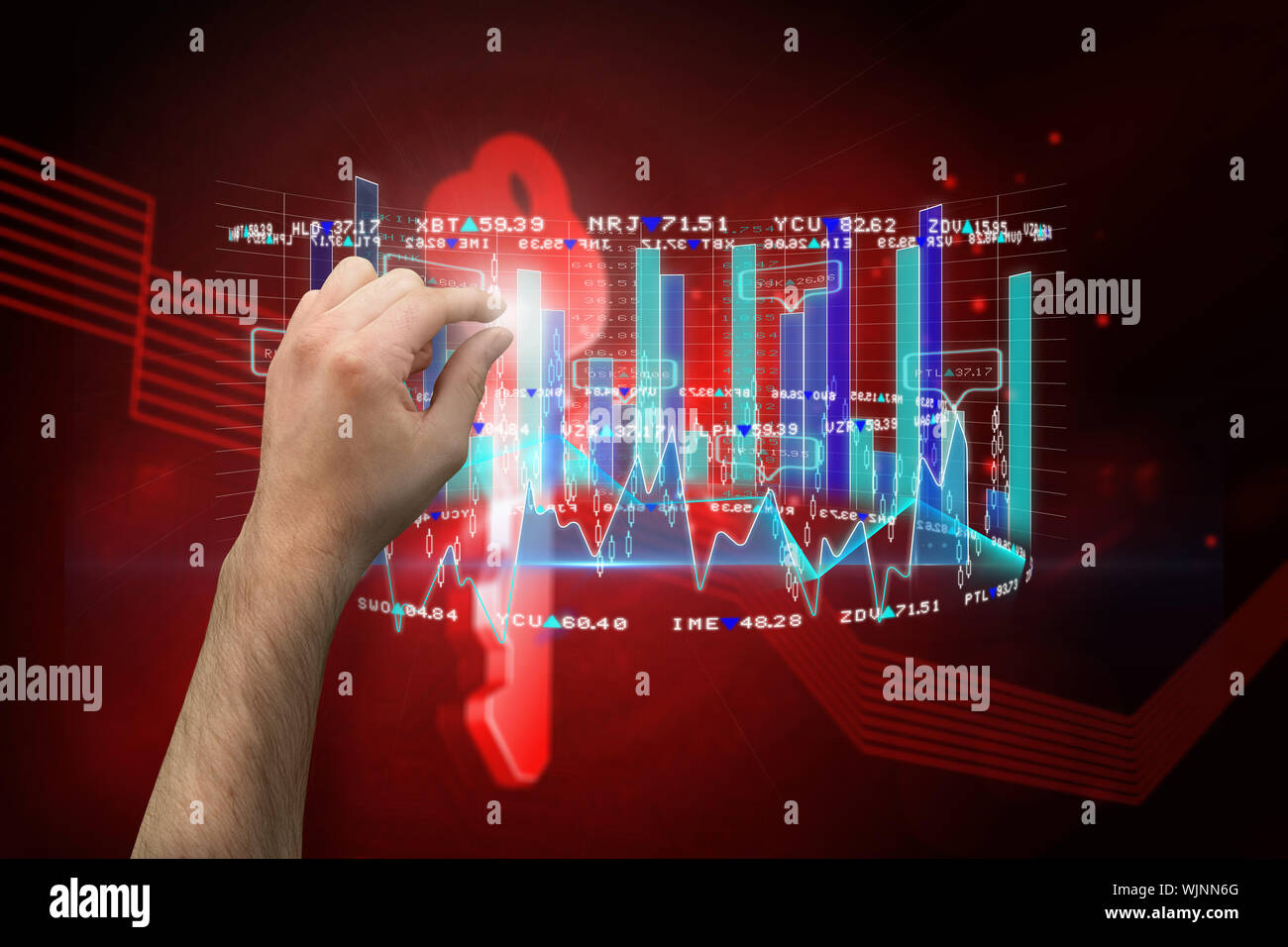 Hand presenting against shiny red key on black background Stock Photo