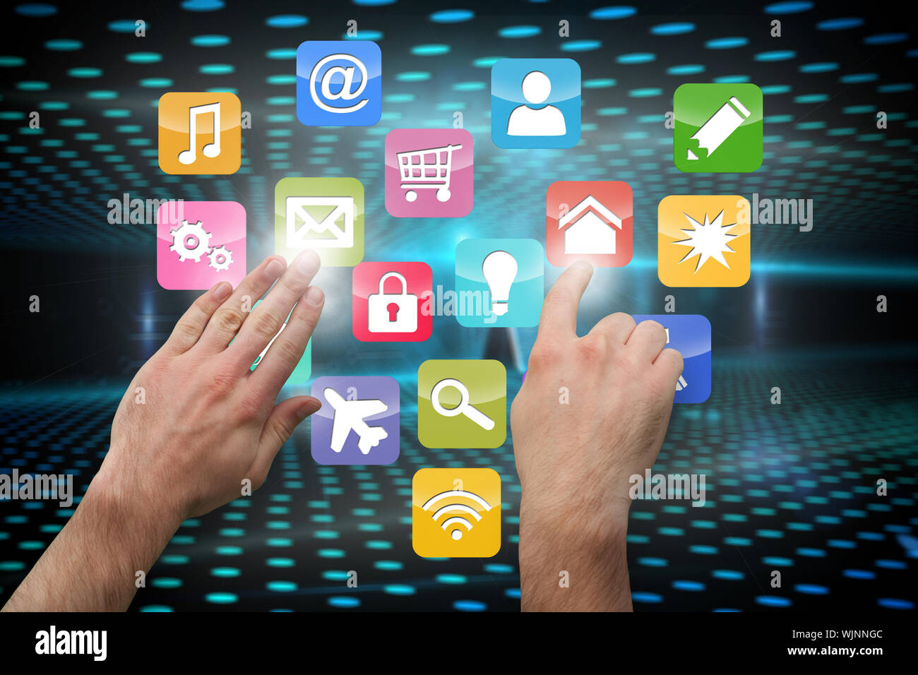 Hands pointing and presenting against keyhole on technological glowing background Stock Photo