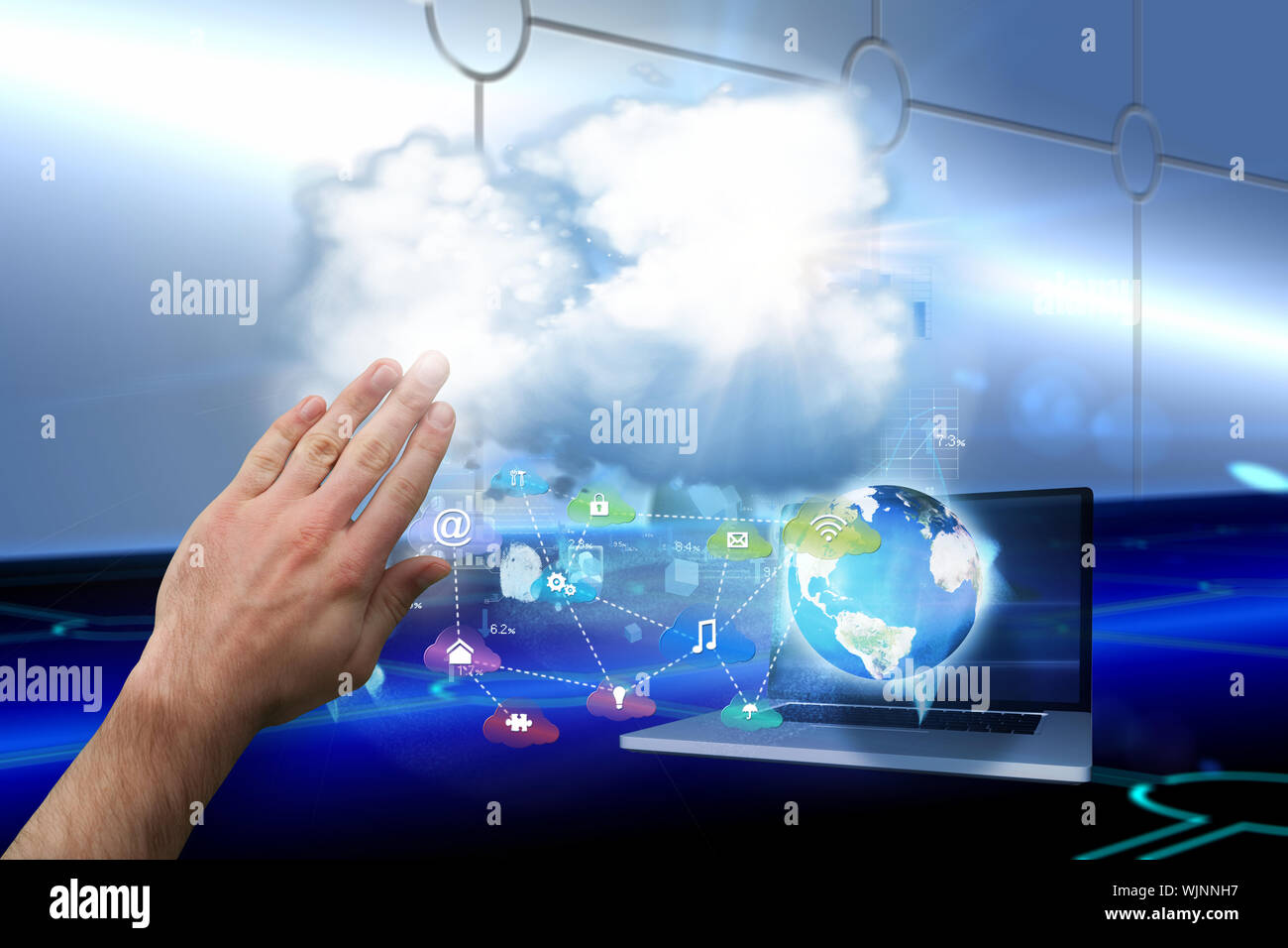 Hand presenting against keyhole on technological background Stock Photo