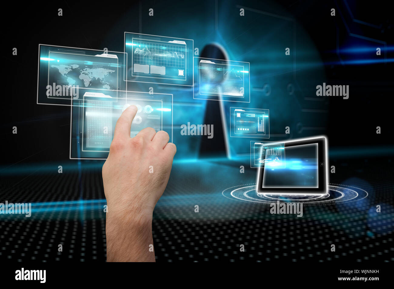 Hand pointing against keyhole on technological background Stock Photo