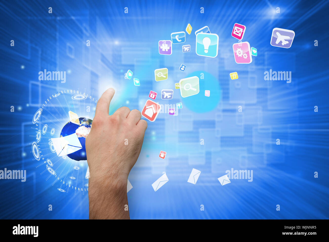Hand pointing against shiny technological background Stock Photo