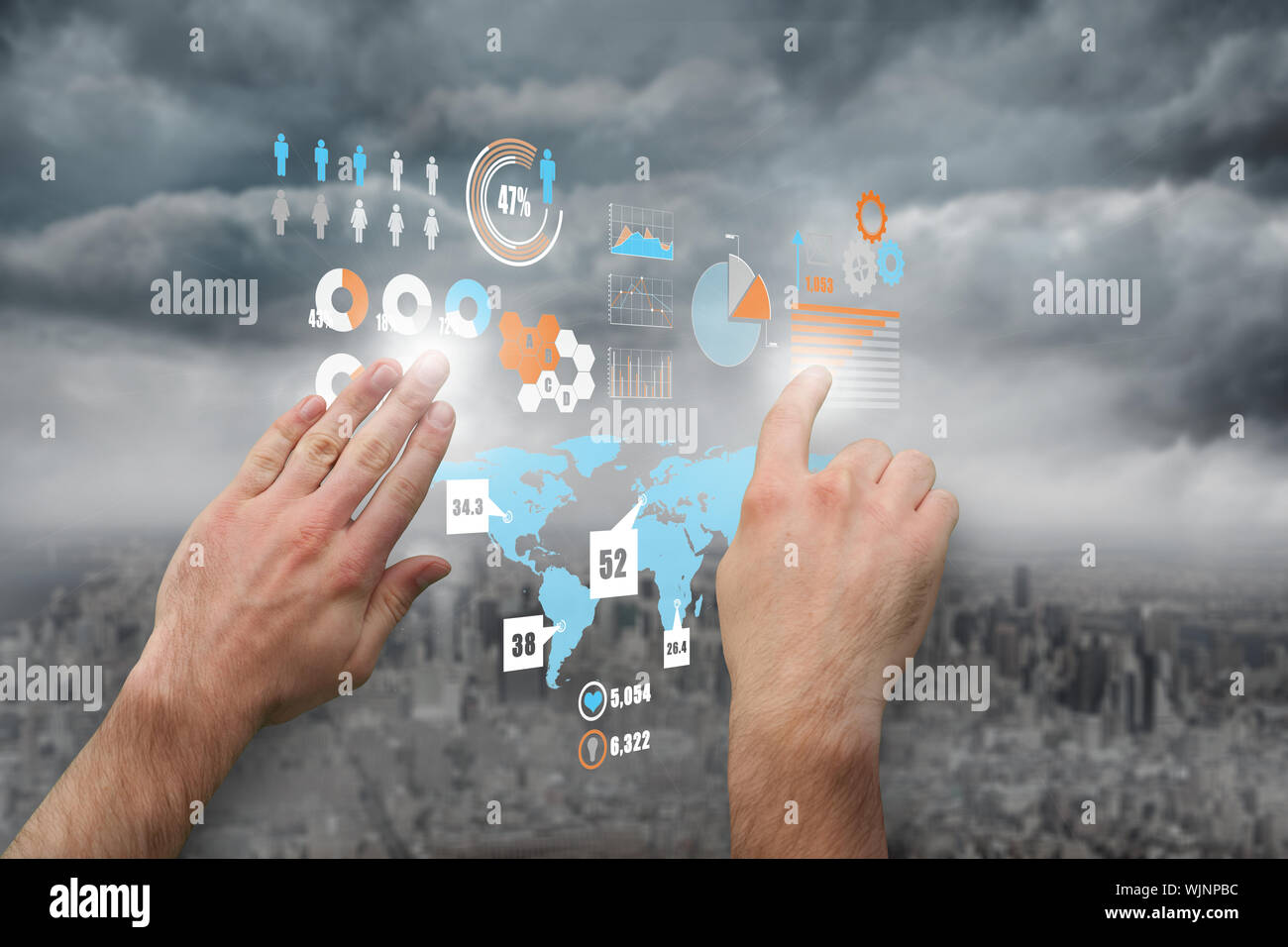 Hands pointing and presenting against gloomy city Stock Photo