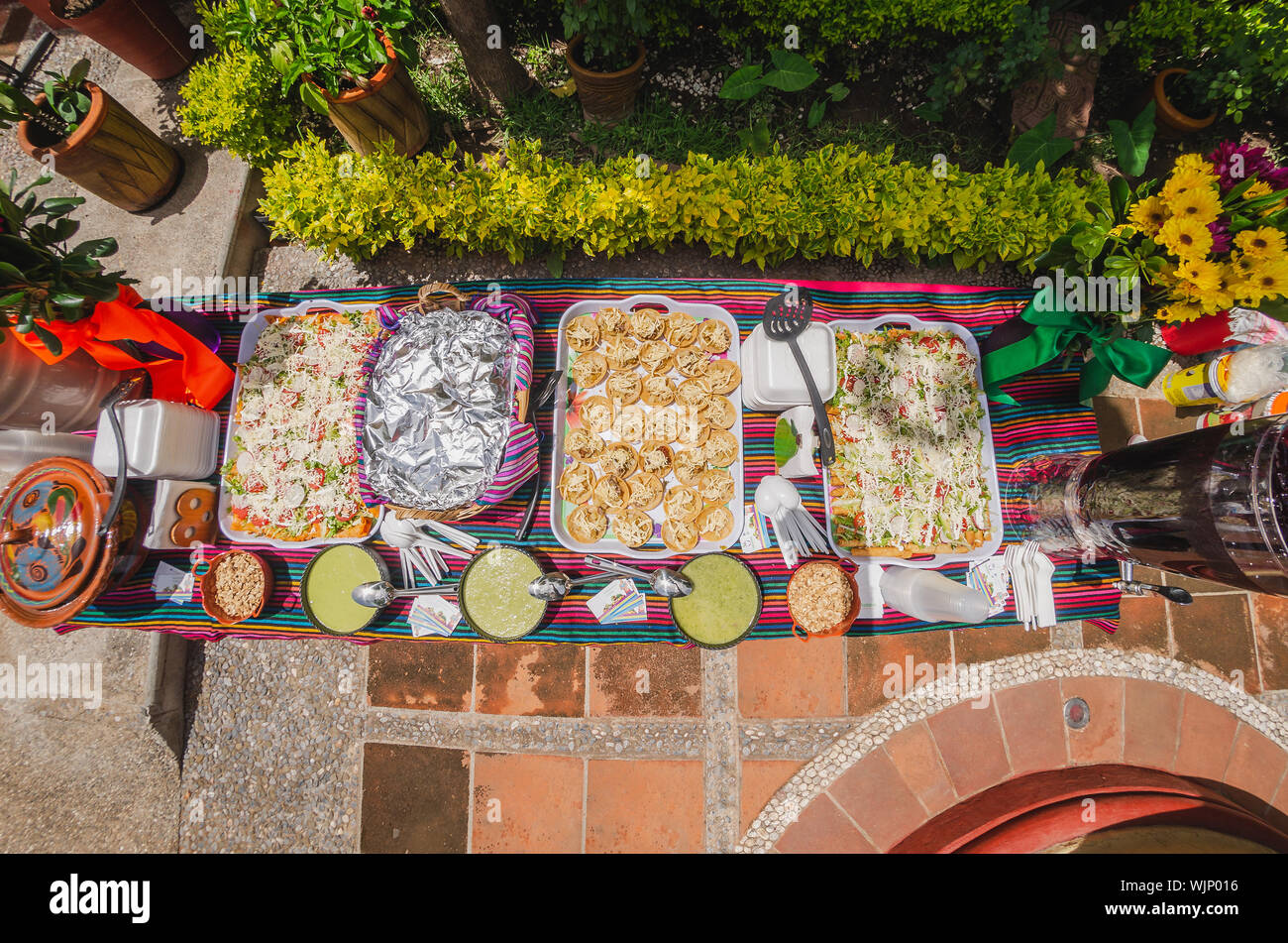 Table of different mexican food for a mexican buffet party Stock Photo