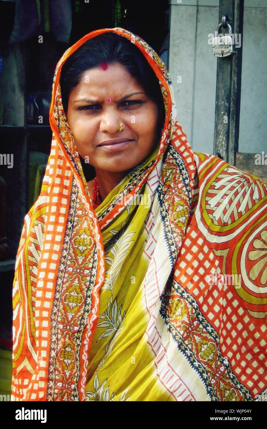 Portrait Of Smiling Woman In Sari Stock Photo - Alamy