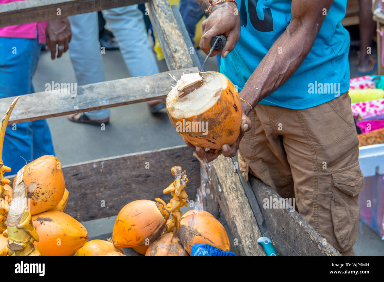 Coconut stall man hires stock photography and images Alamy