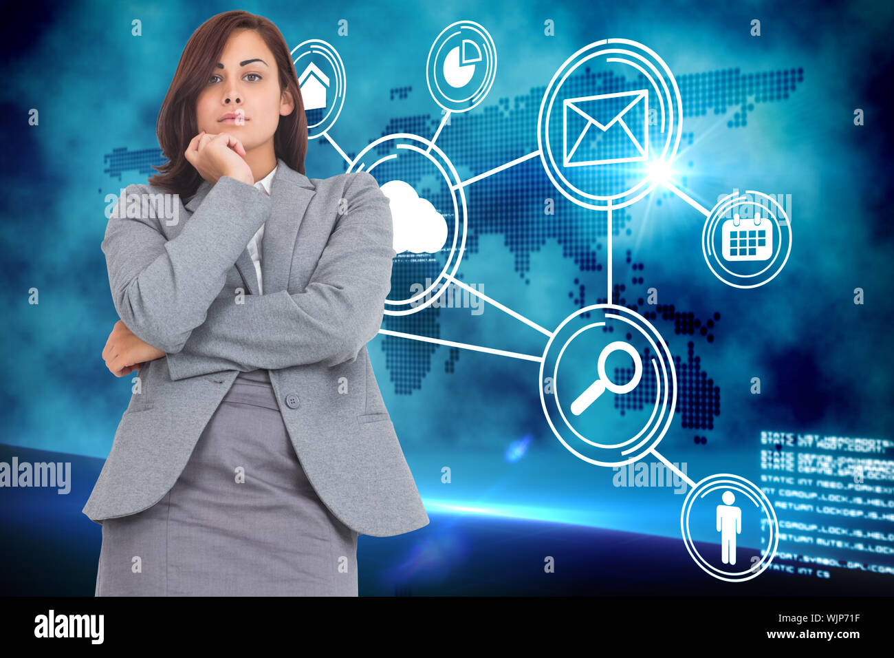 Focused businesswoman against futuristic technology interface Stock Photo