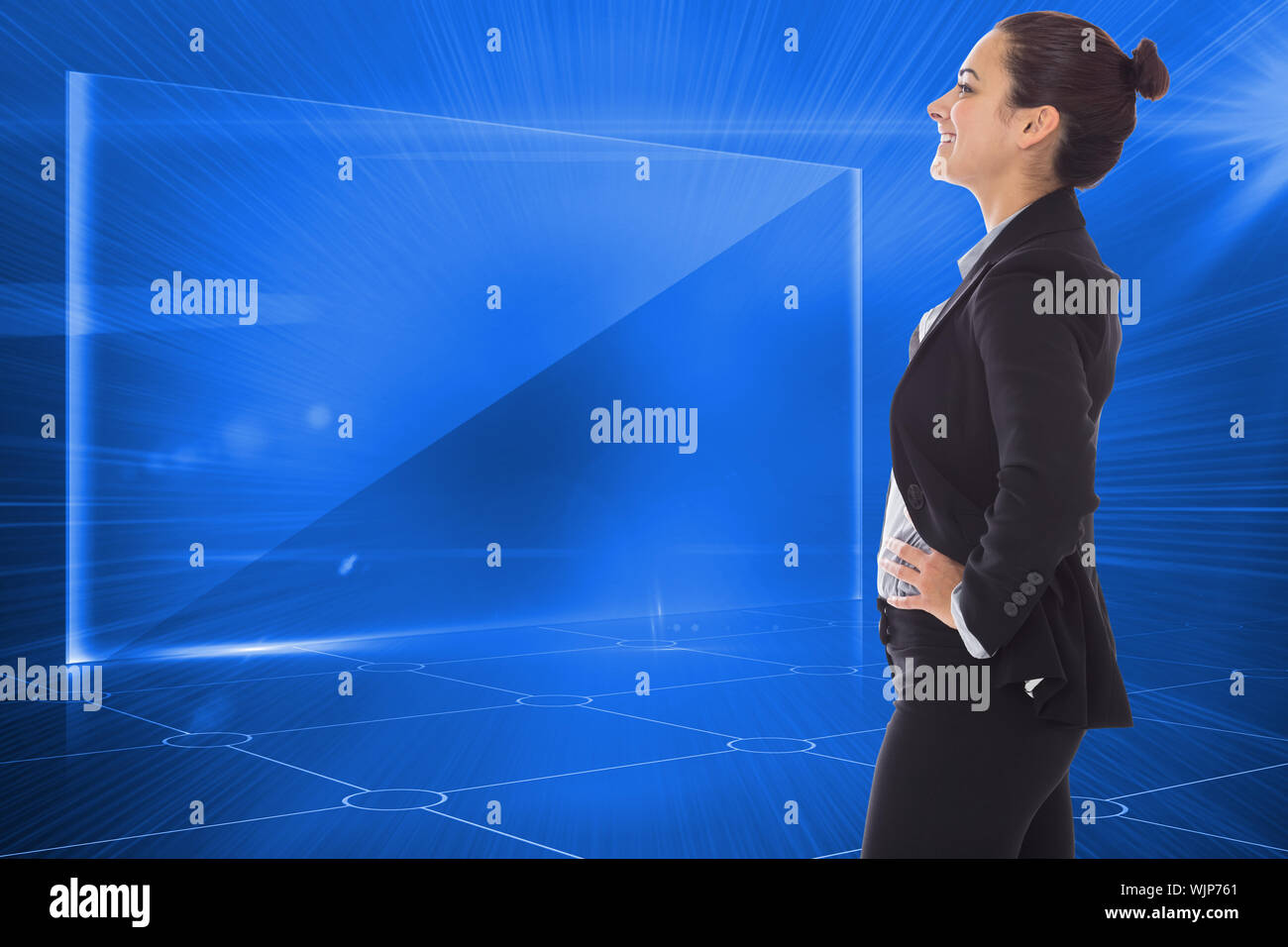 Happy businesswoman against futuristic technology interface Stock Photo