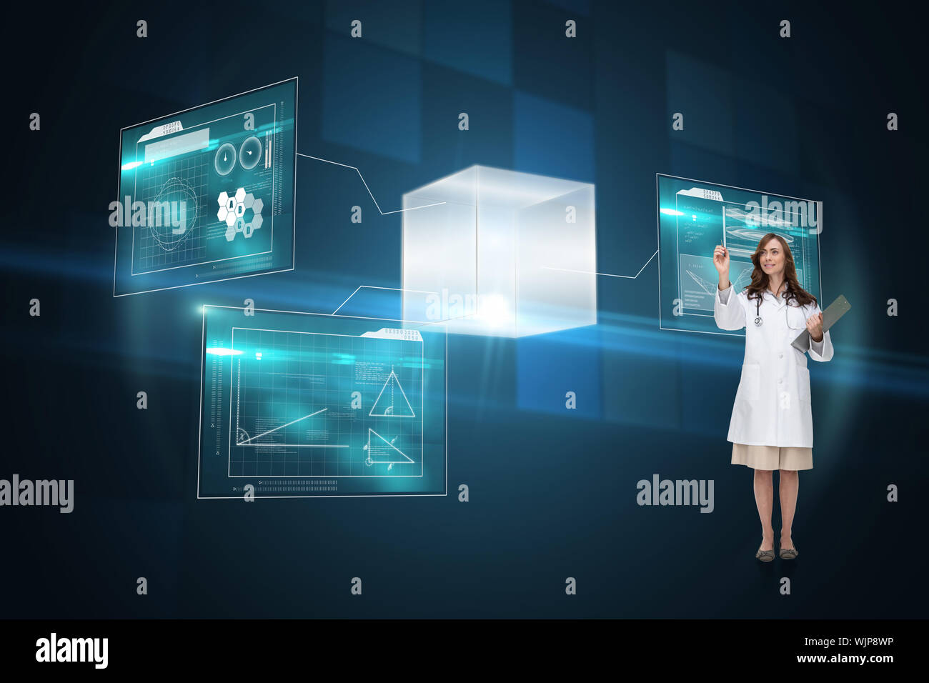 Smiling doctor pointing against technical background with squars Stock Photo