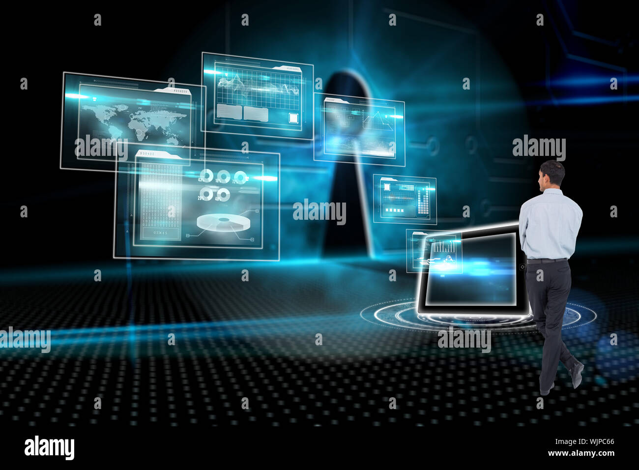Smiling asian businessman  against keyhole on technological background Stock Photo