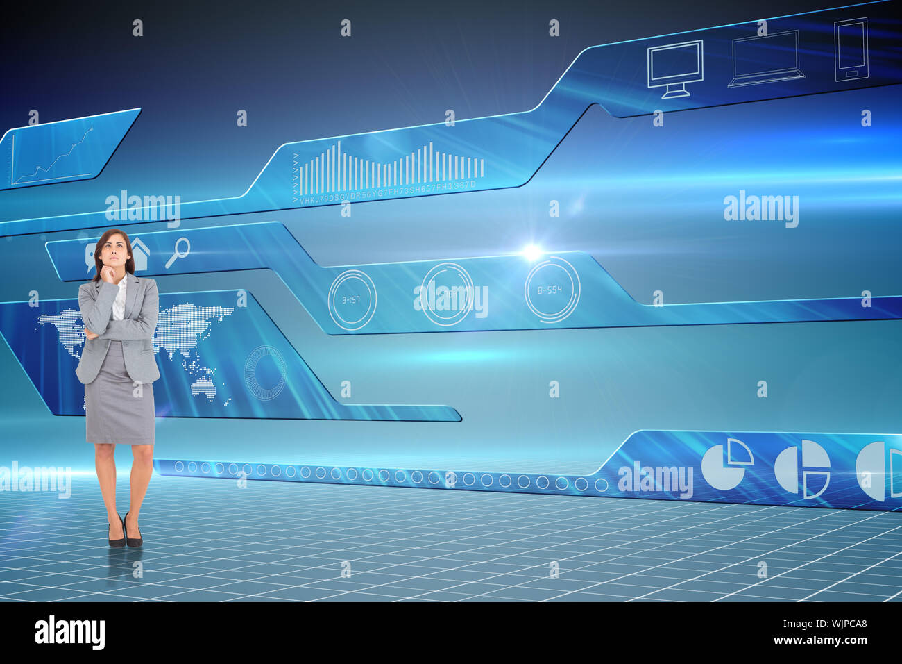 Focused businesswoman against futuristic technology interface Stock Photo
