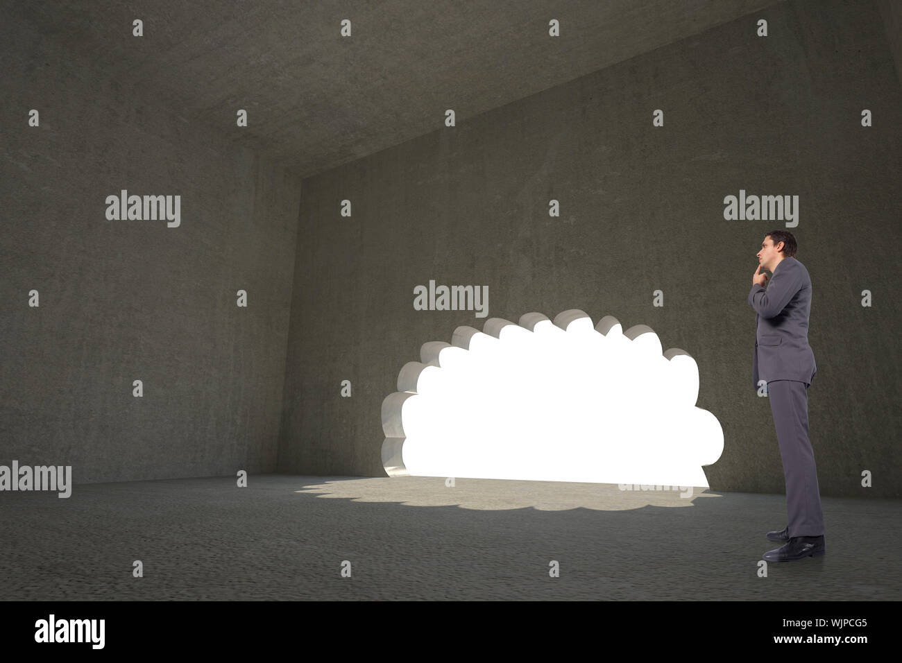Thinking businessman with hand on chin against cloud shaped door in dark room Stock Photo