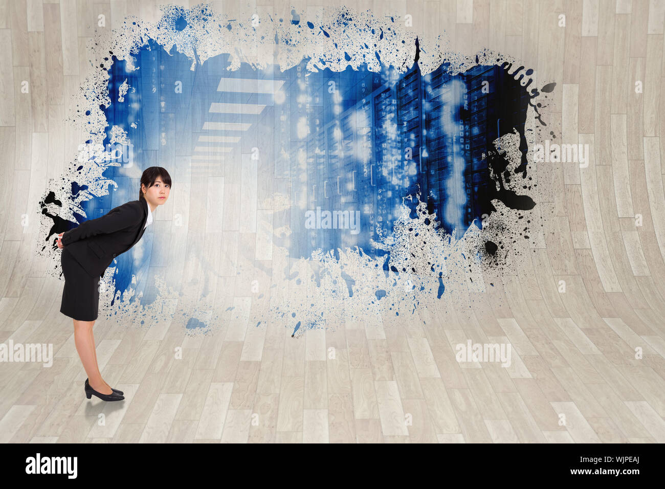 Serious businesswoman bending against splash showing data hallway Stock Photo