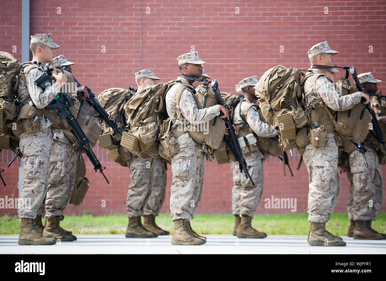 Beaufort, South Carolina, USA. 03 September, 2019. U.S. Marine recruits line up to board buses for evacuation at the Marine Corps Recruit Depot Parris Island September 3, 2019 in Beaufort, South Carolina. The low lying region is under a mandatory evacuation order as Hurricane Dorian begins making way up the East Coast to South Carolina.  Credit: Dana Beesley/USMC/Alamy Live News Stock Photo