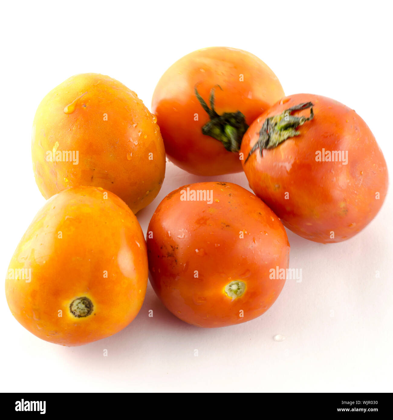 food vegetable ugly tomato isolated on white background Stock Photo - Alamy