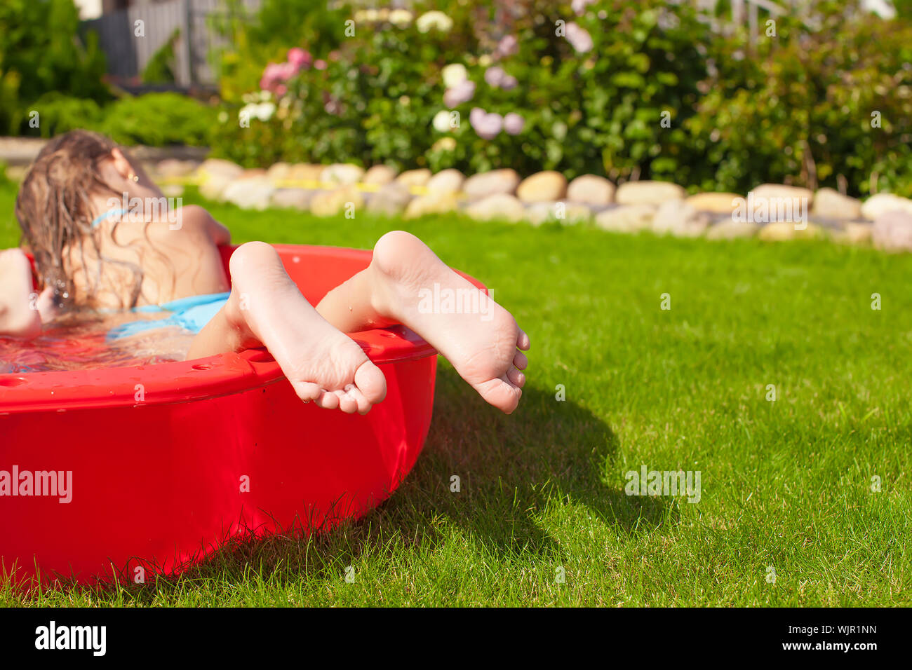 Closeup of a little girl's legs in the pool Stock Photo Alamy