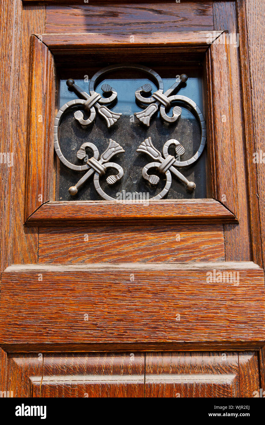 Wood door wrought iron hi-res stock photography and images - Alamy