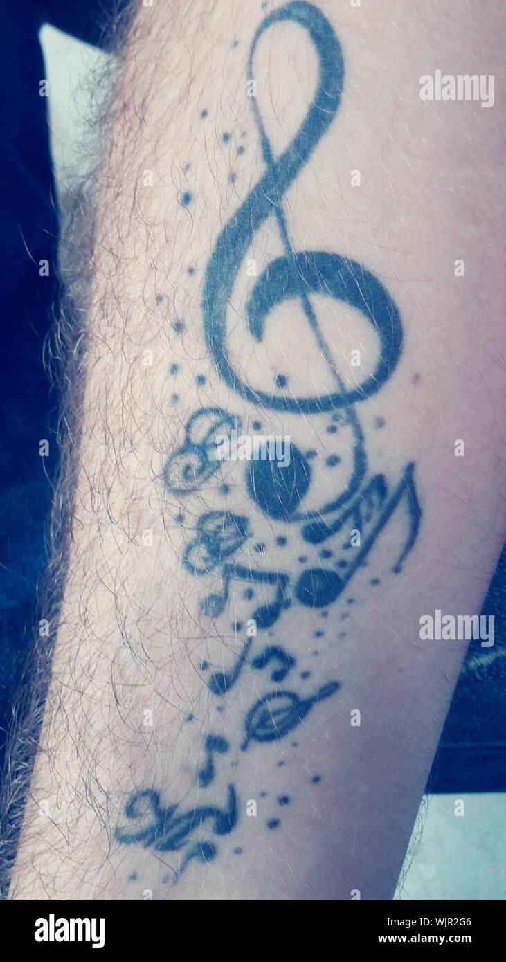 Musical notes tattoo hi-res stock photography and images - Alamy