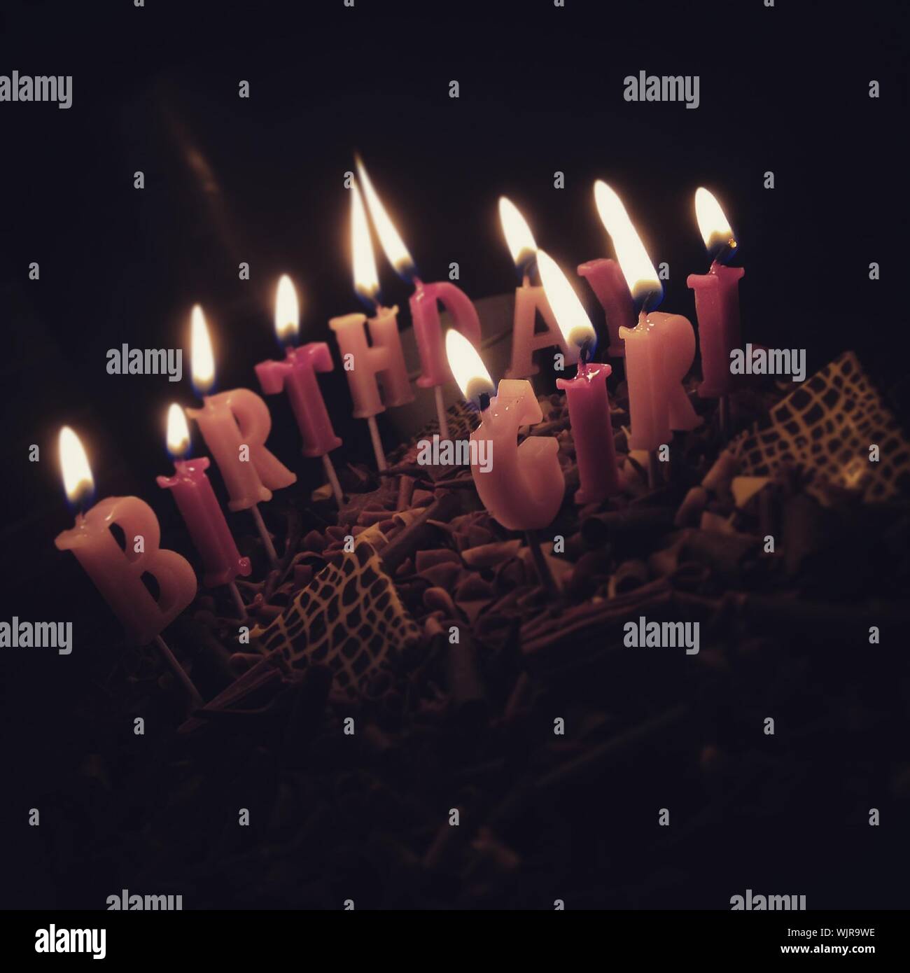 Lit birthday cake candles hires stock photography and images Alamy