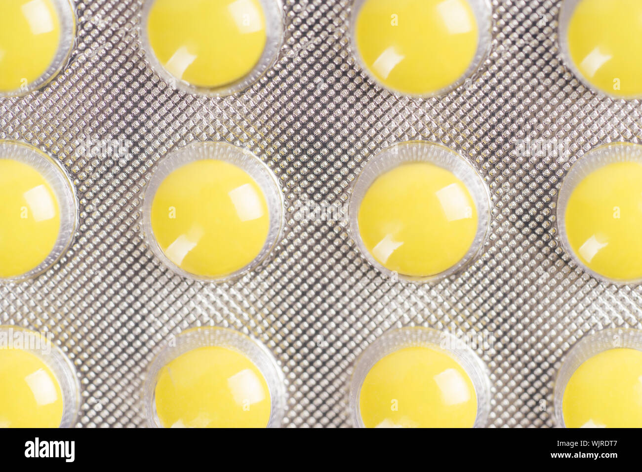 Download Full Frame Shot Of Yellow Pills In Blister Pack Stock Photo Alamy PSD Mockup Templates