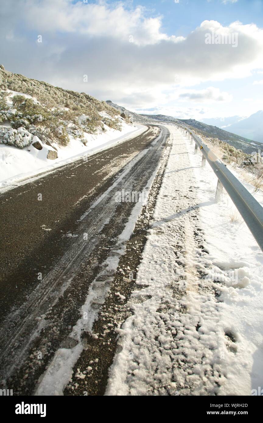 road with snow at gredos mountains in avila spain Stock Photo Alamy