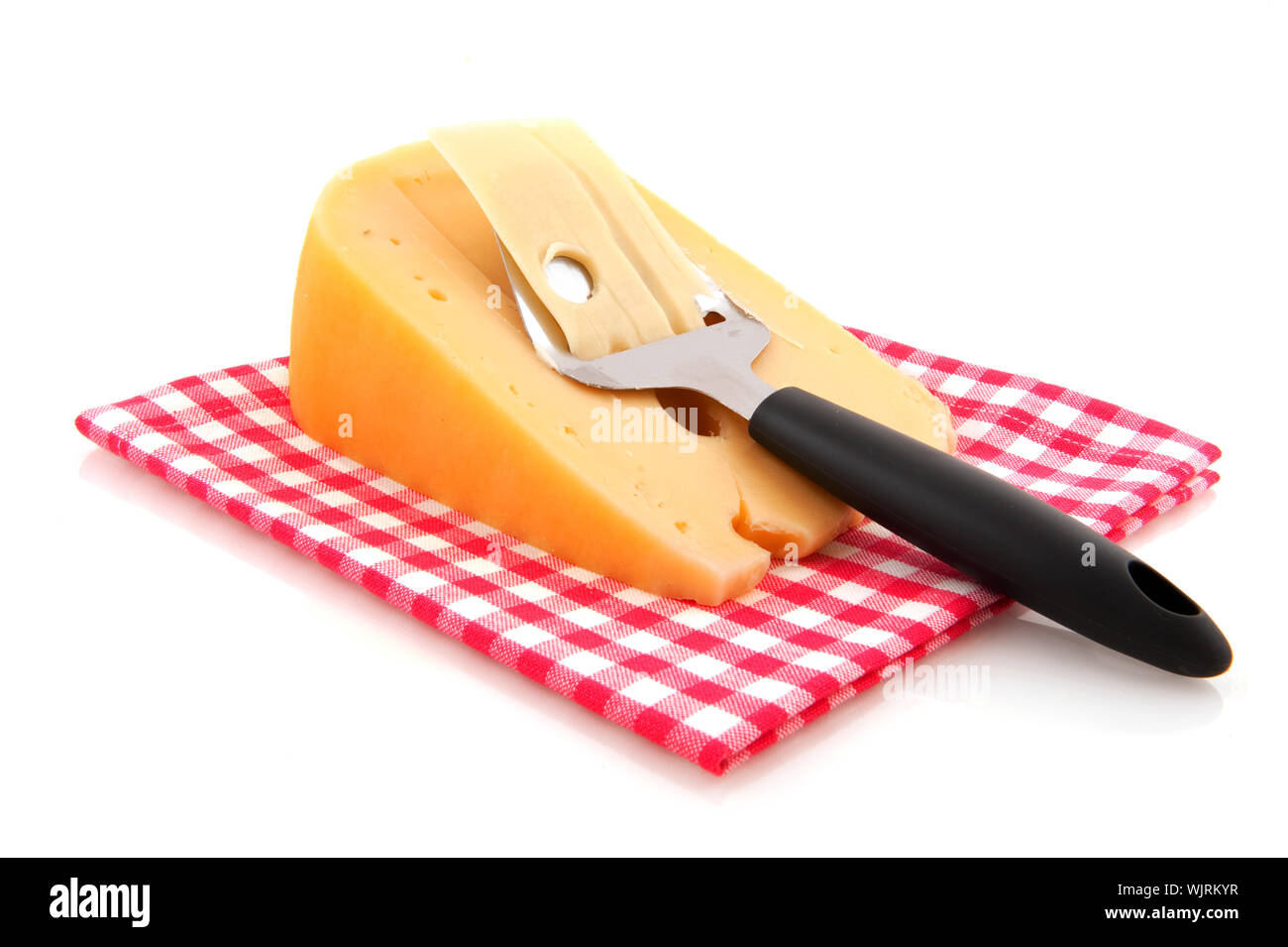 Dutch cheese with typical slicer isolated over white Stock Photo Alamy