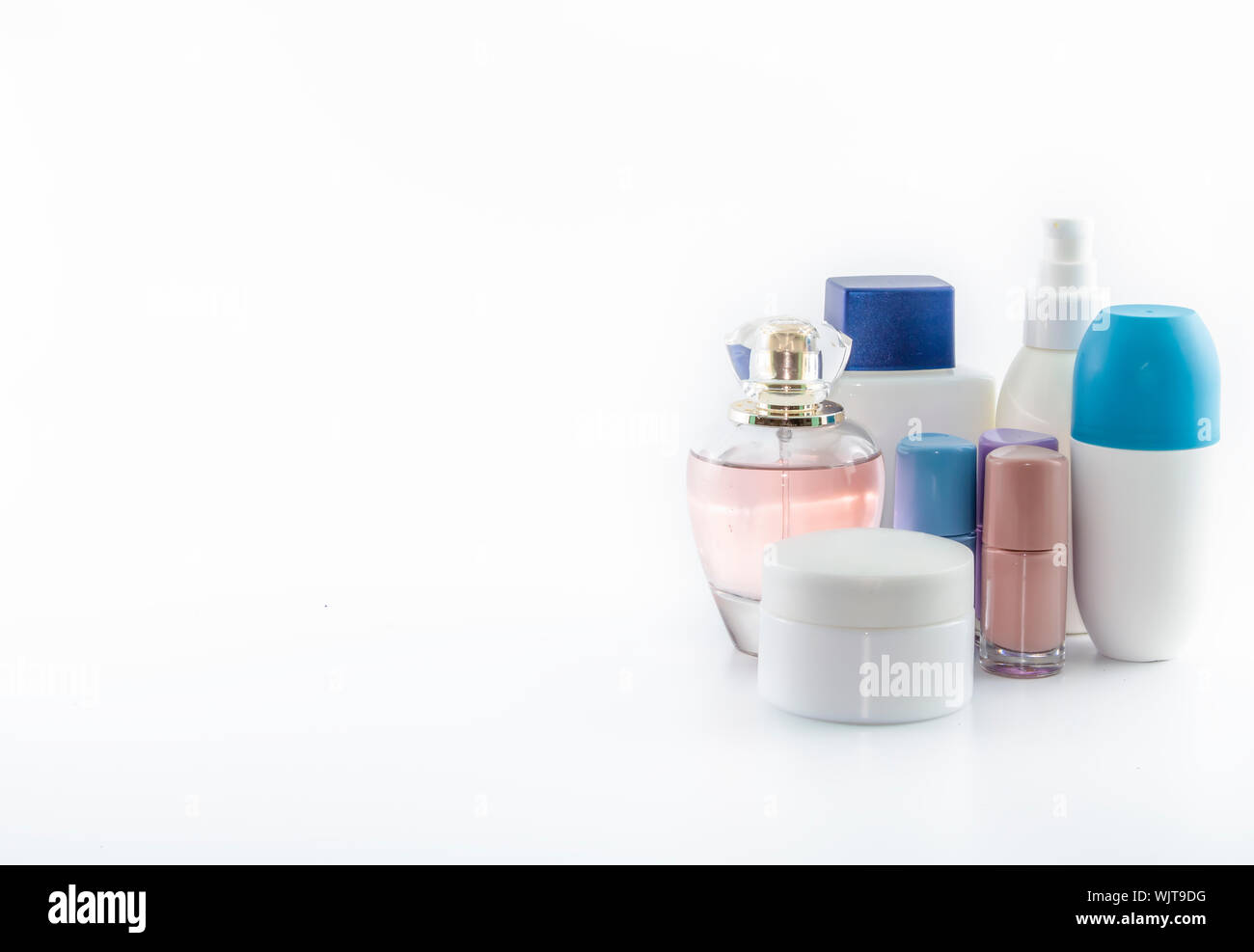 Set consisting of sun cream, parfum, nail polish, lotion. isolated