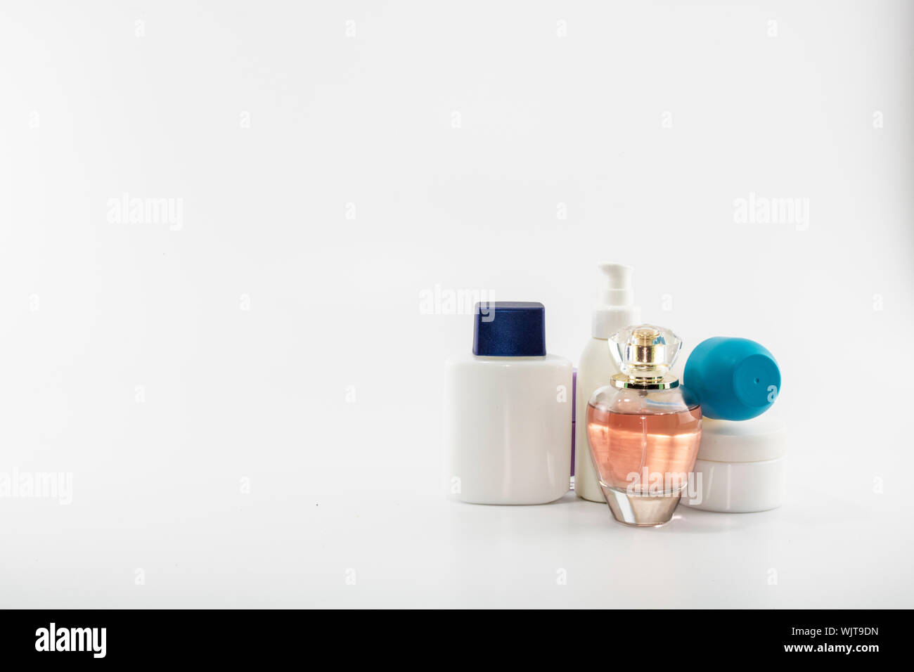 Set consisting of sun cream, parfum, nail polish, lotion. isolated