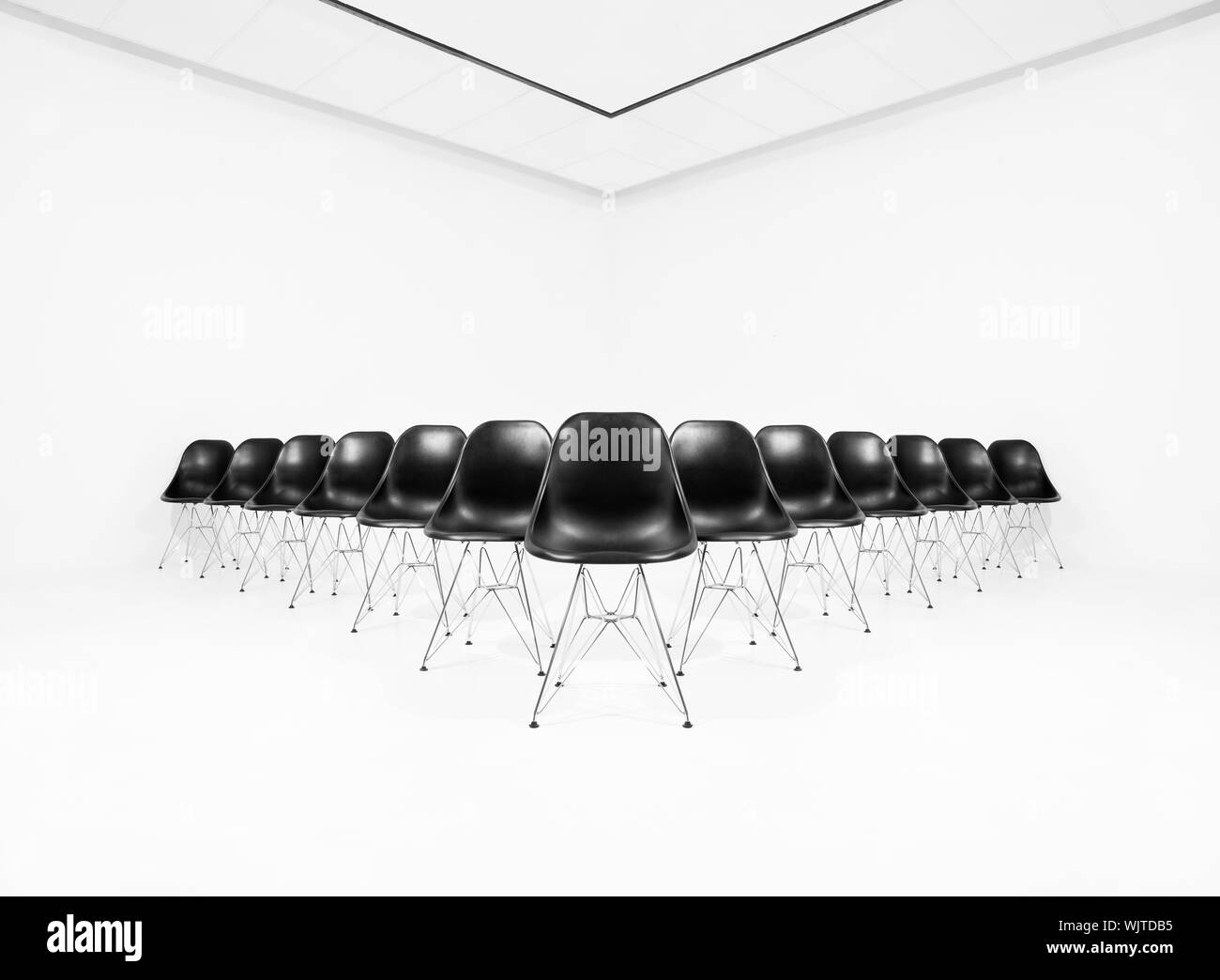 Row chairs in room Black and White Stock Photos & Images - Alamy