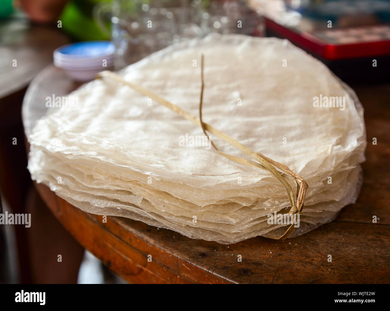 Vietnamese dry rice wafers (Banh trang or banh da nem) on a table Stock ...