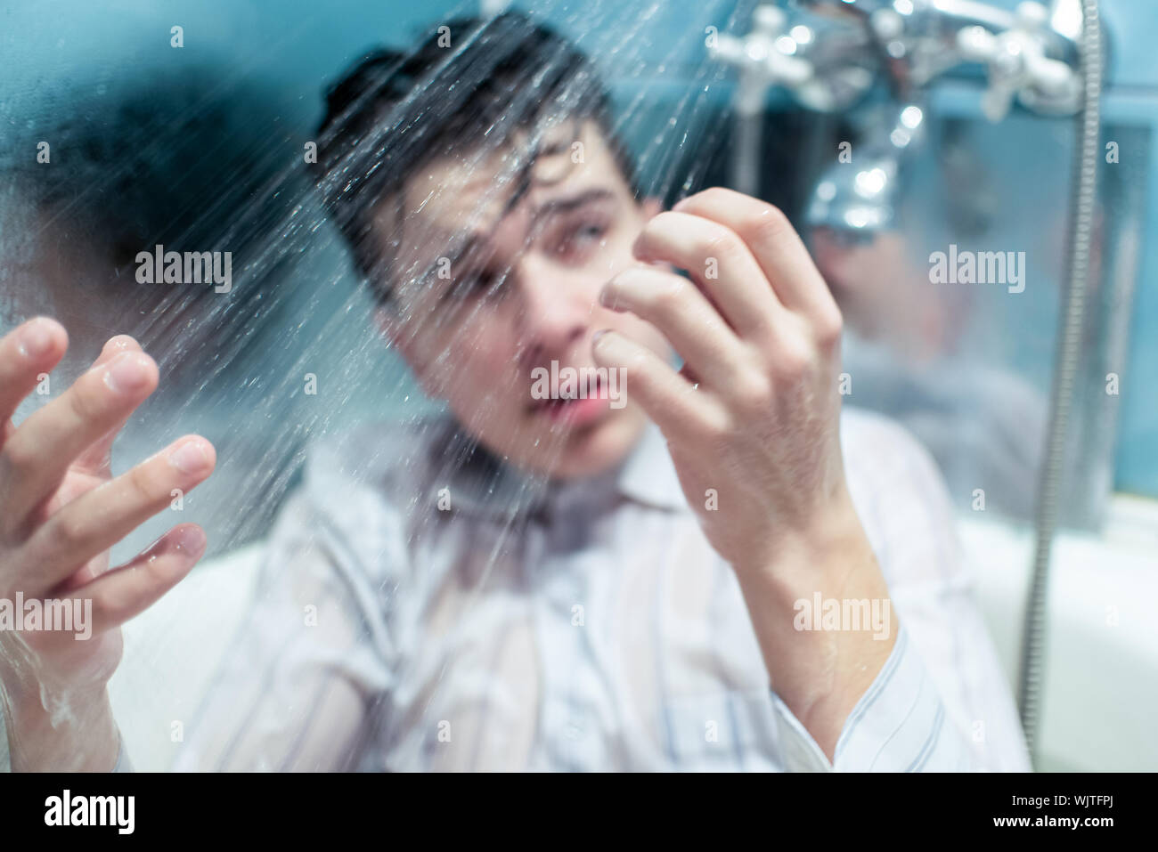 Man wet shower bathroom hires stock photography and images Alamy
