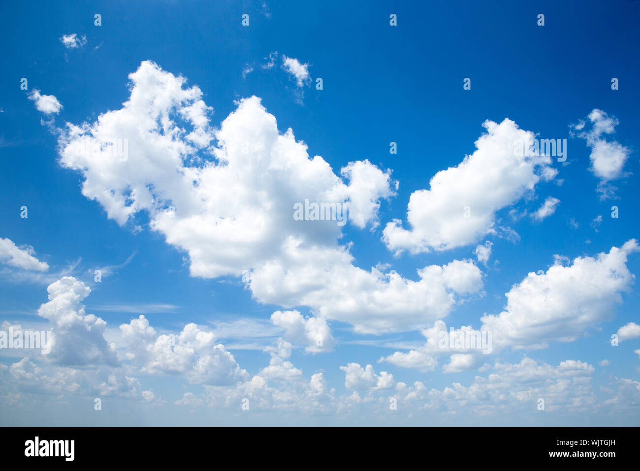 blue sky background with tiny clouds Stock Photo Alamy