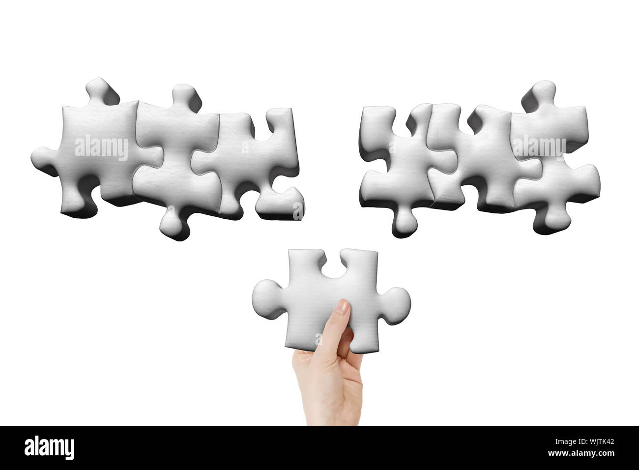 Hand hold a jigsaw puzzle piece, isolated on white Stock Photo - Alamy