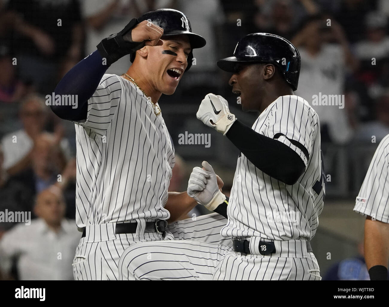 Bronx, United States. 03rd Sep, 2019. New York Yankees teammates Aaron Judge and Didi Gregorius celebrate at the plate after Gregorius' three-run home run against the Texas Rangers in the sixth inning at Yankee Stadium in New York City on Sunday, September 3, 2019. Photo by Ray Stubblebine/UPI Credit: UPI/Alamy Live News Stock Photo