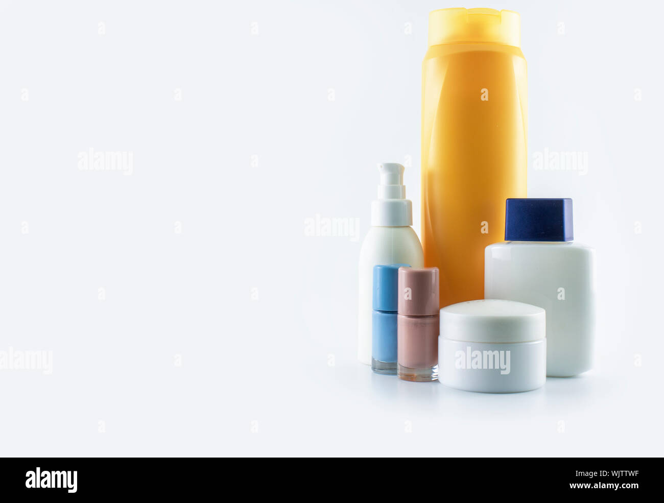 Set consisting of sun cream, parfum, nail polish, lotion. isolated