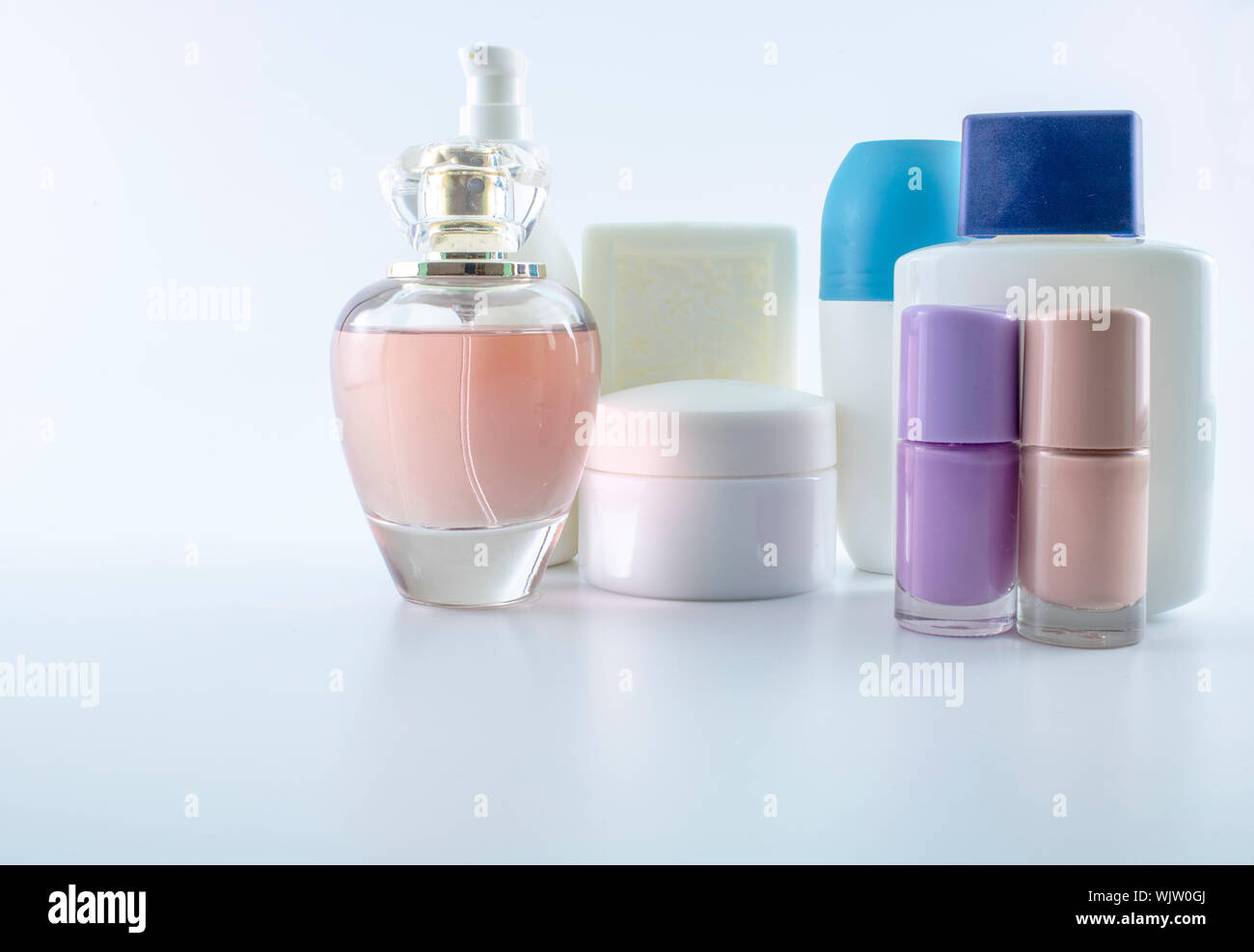 Set consisting of sun cream, parfum, nail polish, lotion. isolated