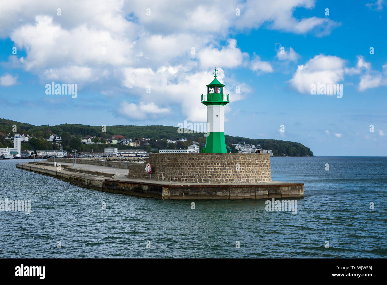 Lighthouse At Sassnitz Over Baltic Sea Against Sky Stock Photo