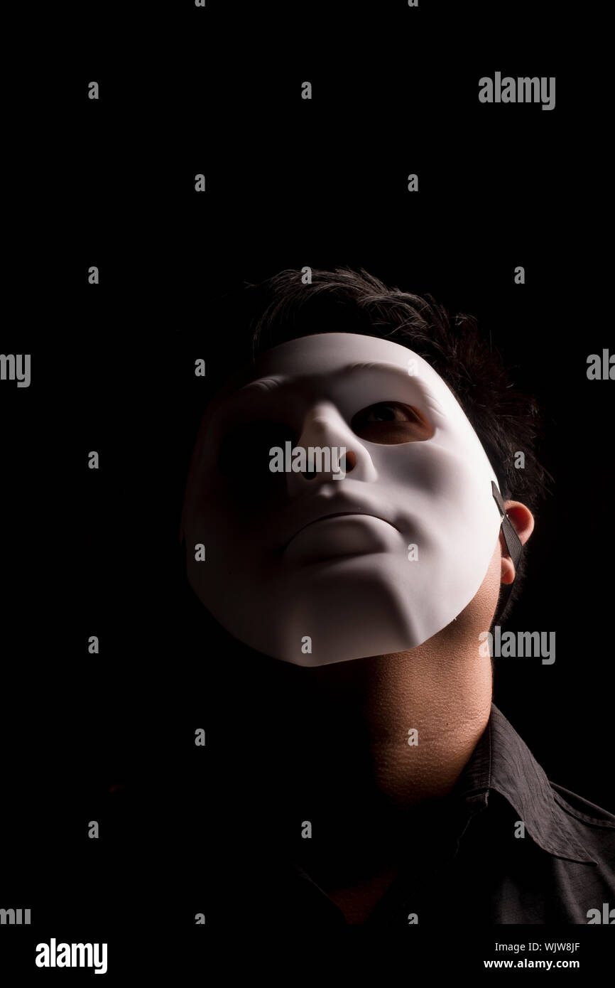 Wearing black mask hi-res stock photography and images - Alamy