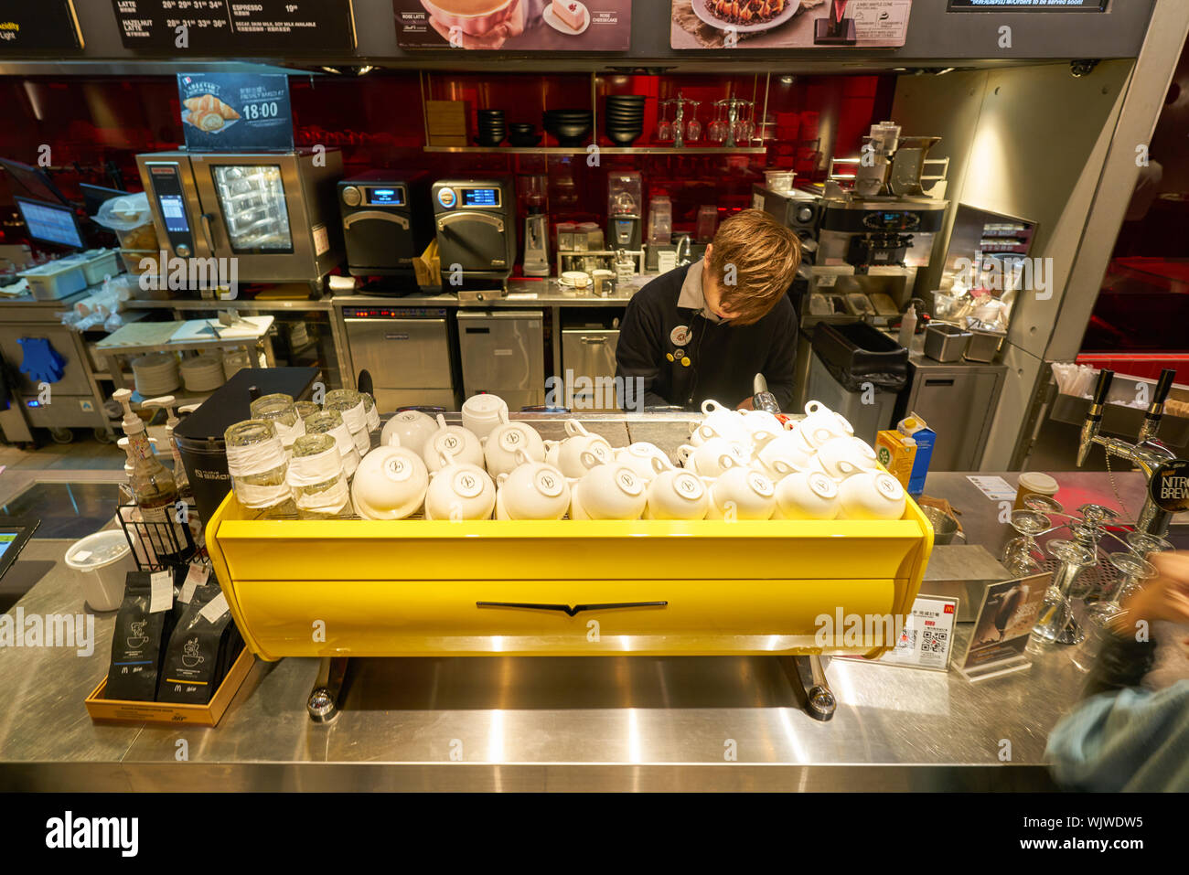 Mccafe Worker HONG KONG, CHINA - CIRCA FEBRUARY, 2019: worker at McCafe in Hong Kong ...