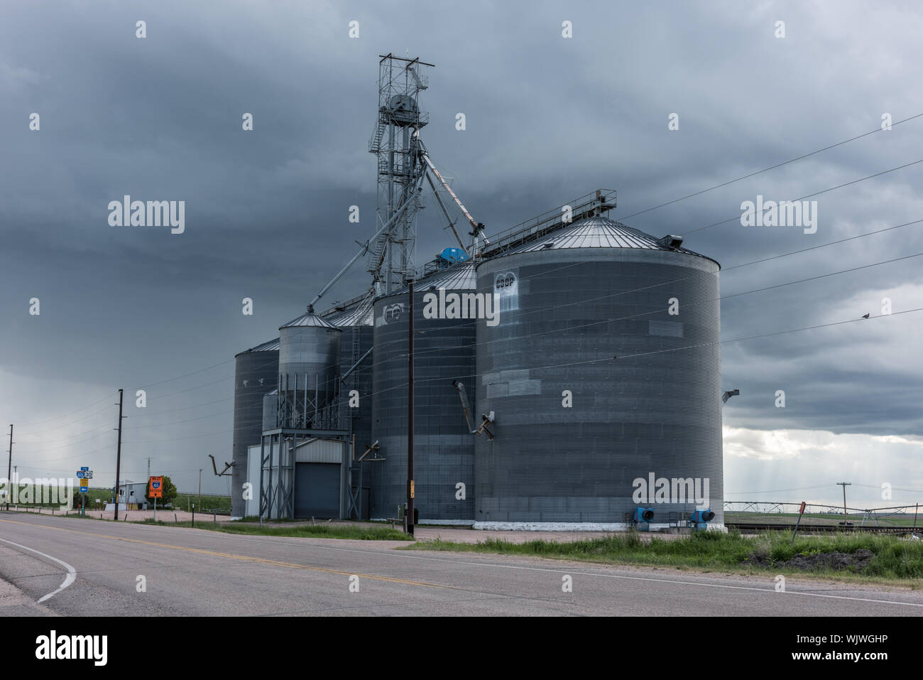 Huge agricultural bins in Pine Bluffs, a small farming community on the Nebraska border in Laramie County, Wyoming Stock Photo