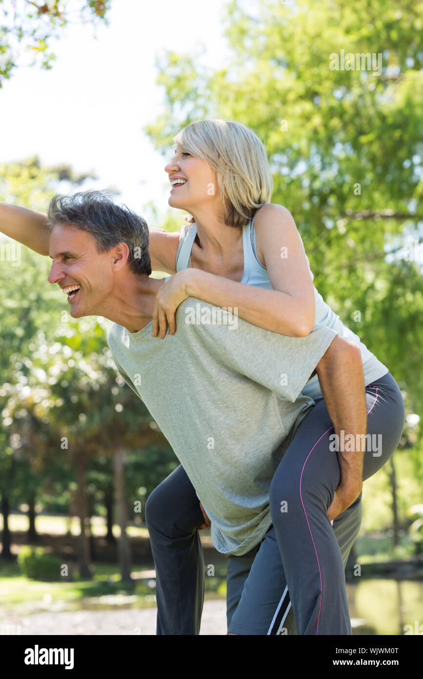 Couple playing piggyback ride in hi-res stock photography and images ...