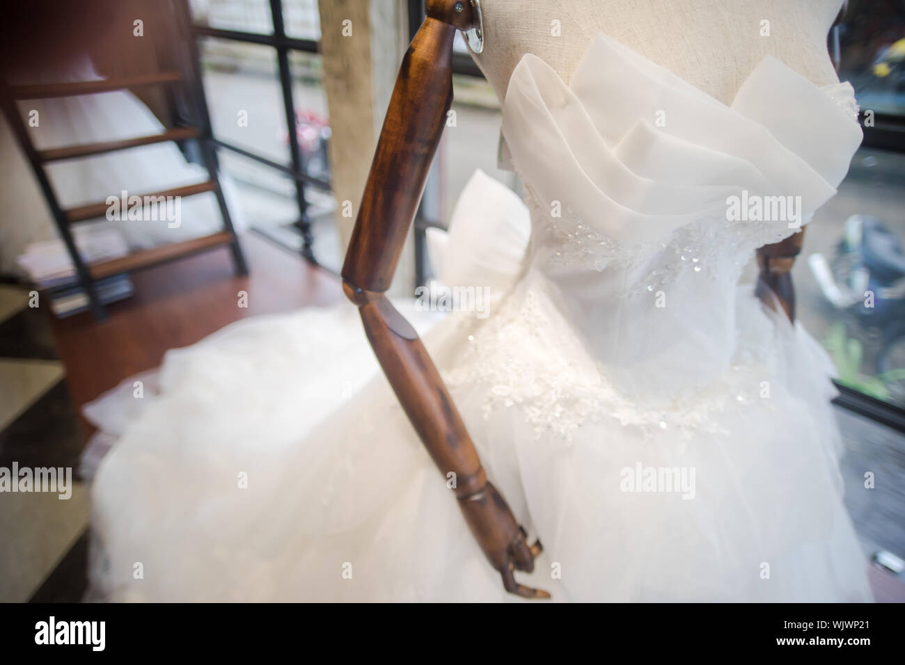 Close-up Of White Dress In Display At Shop For Sale Stock Photo